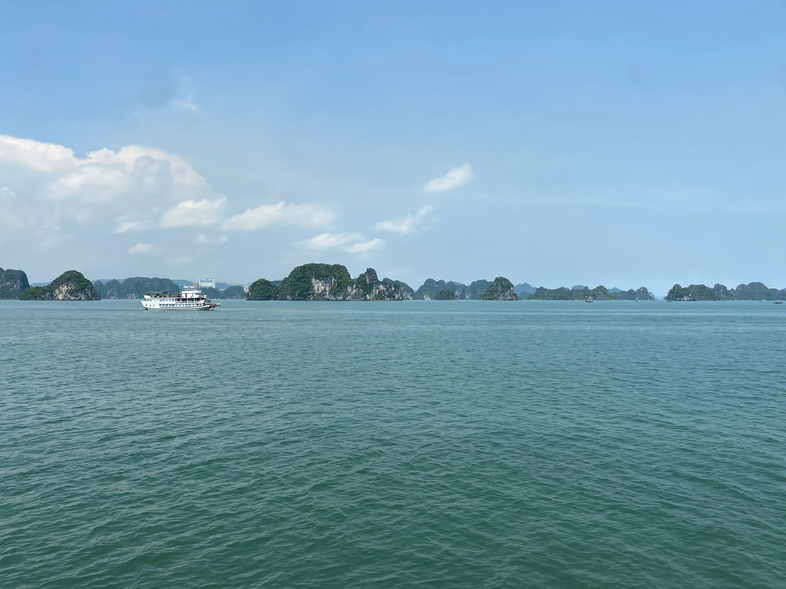 Limestone islands rising from the waters of Ha Long Bay