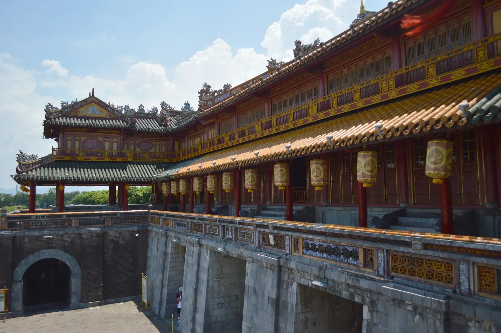 Historic gateway and bridge inside Hue Imperial City in daylight
